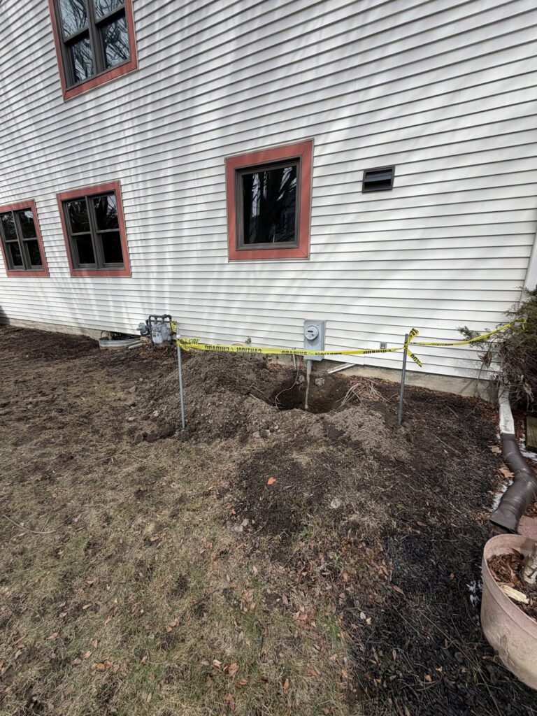 Underground electrical service trench dug by Colonial Electric in Albany NY