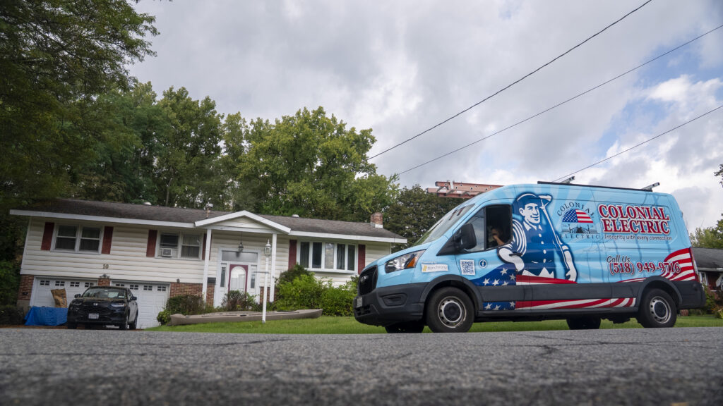 Colonial Electric electrician van in front of a Capital Region home